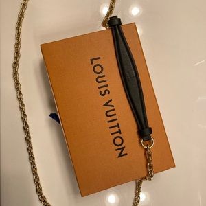 Louis Vuitton black and gold crossbody strap